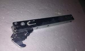 Zawias drzwi piekarnika